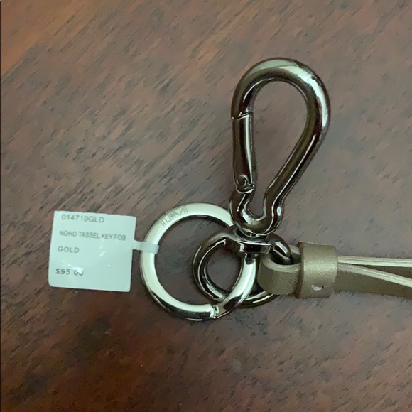 NWT Tumi Tassle Gold Metallic Leather - Picture 3 of 3